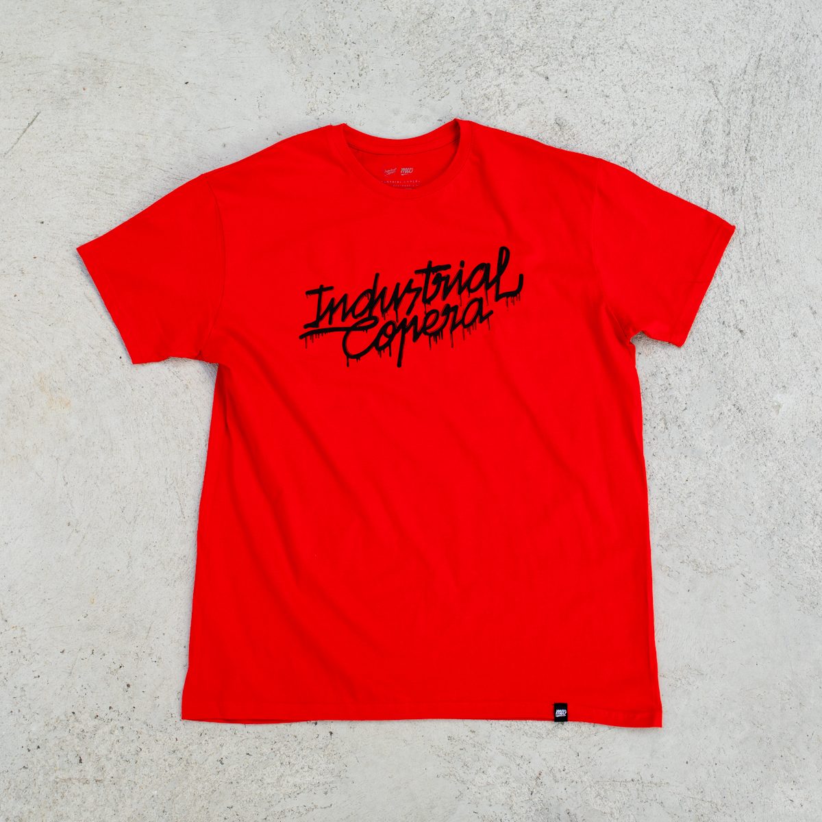 Camiseta roja Industrial Copera logo derretido